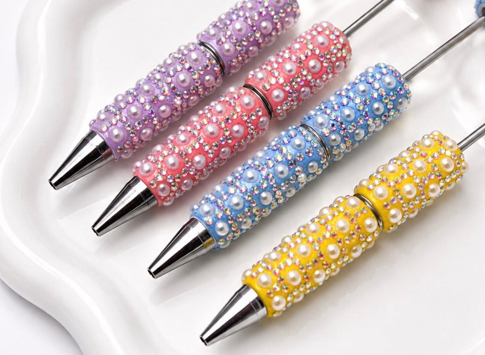 Handmade beaded pens with pearls and rhinestones in pastel colors for DIY crafts and accessories