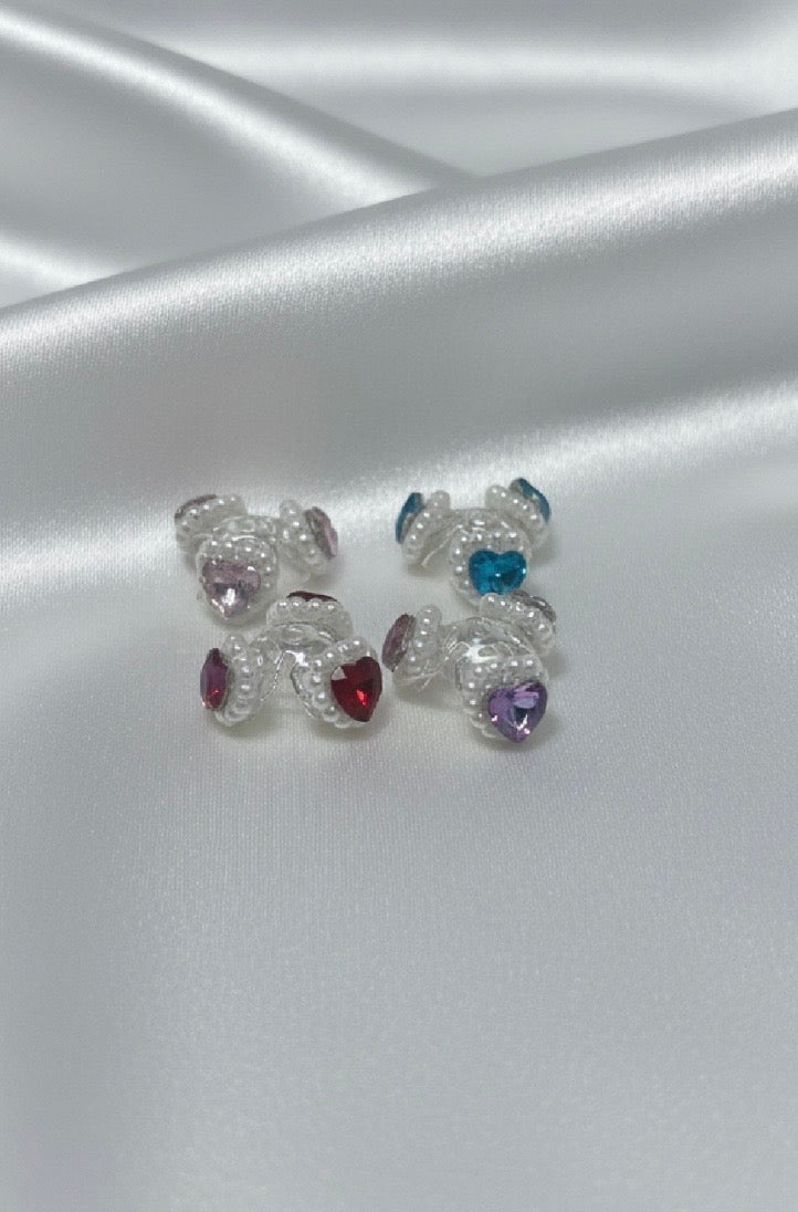Handmade beaded heart charms with colorful crystals, perfect for DIY accessories and crafts