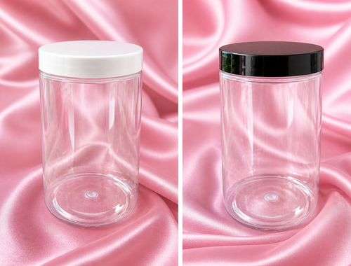 Clear plastic storage jars with white and black lids for beads and craft supplies on pink satin