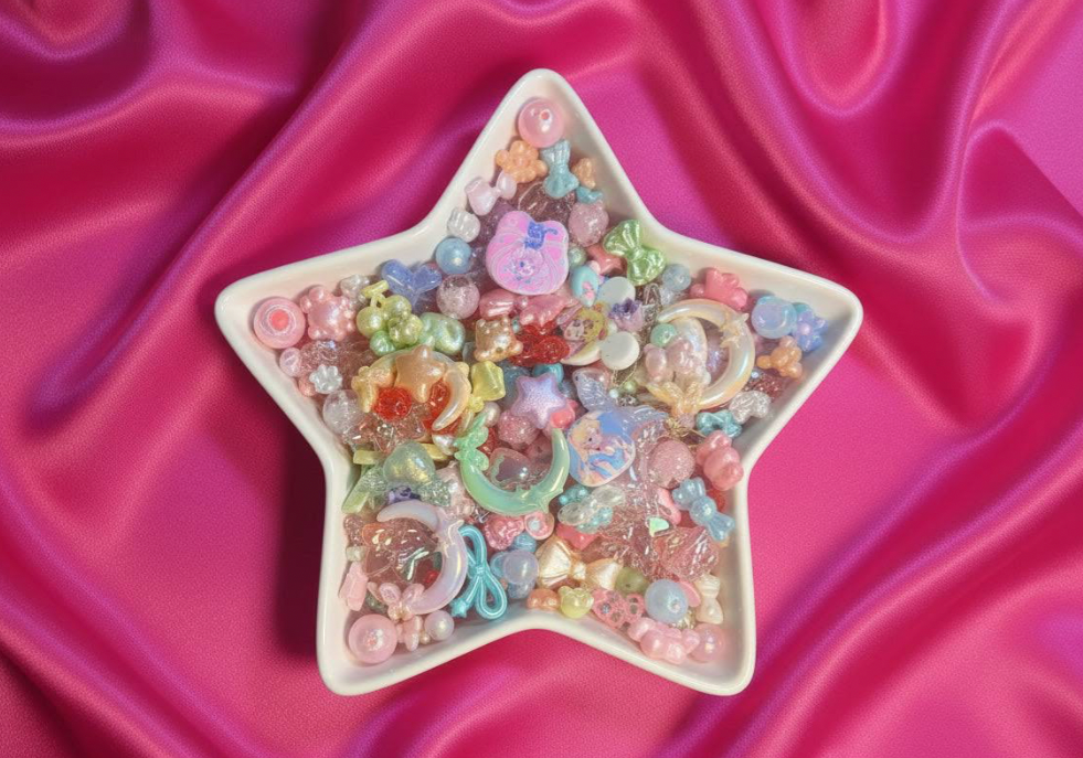 Pastel beaded charms in star dish for DIY jewelry making and crafts