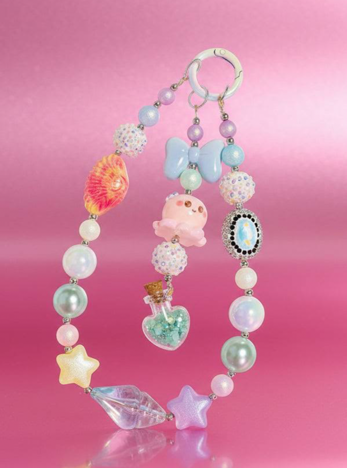 Handmade beaded phone charm with pastel stars, pearls, and cute charms for DIY accessories