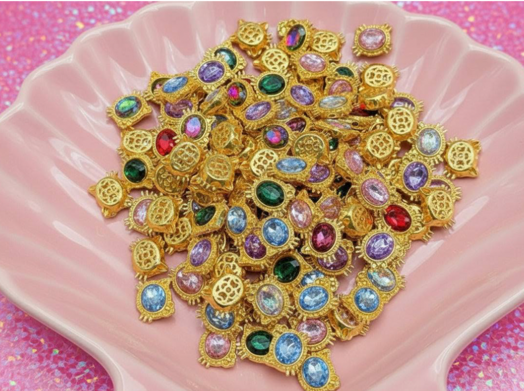 Colorful beaded charms with gold settings for DIY jewelry making and crafting projects