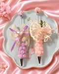Clay beadable pen with pearl bow